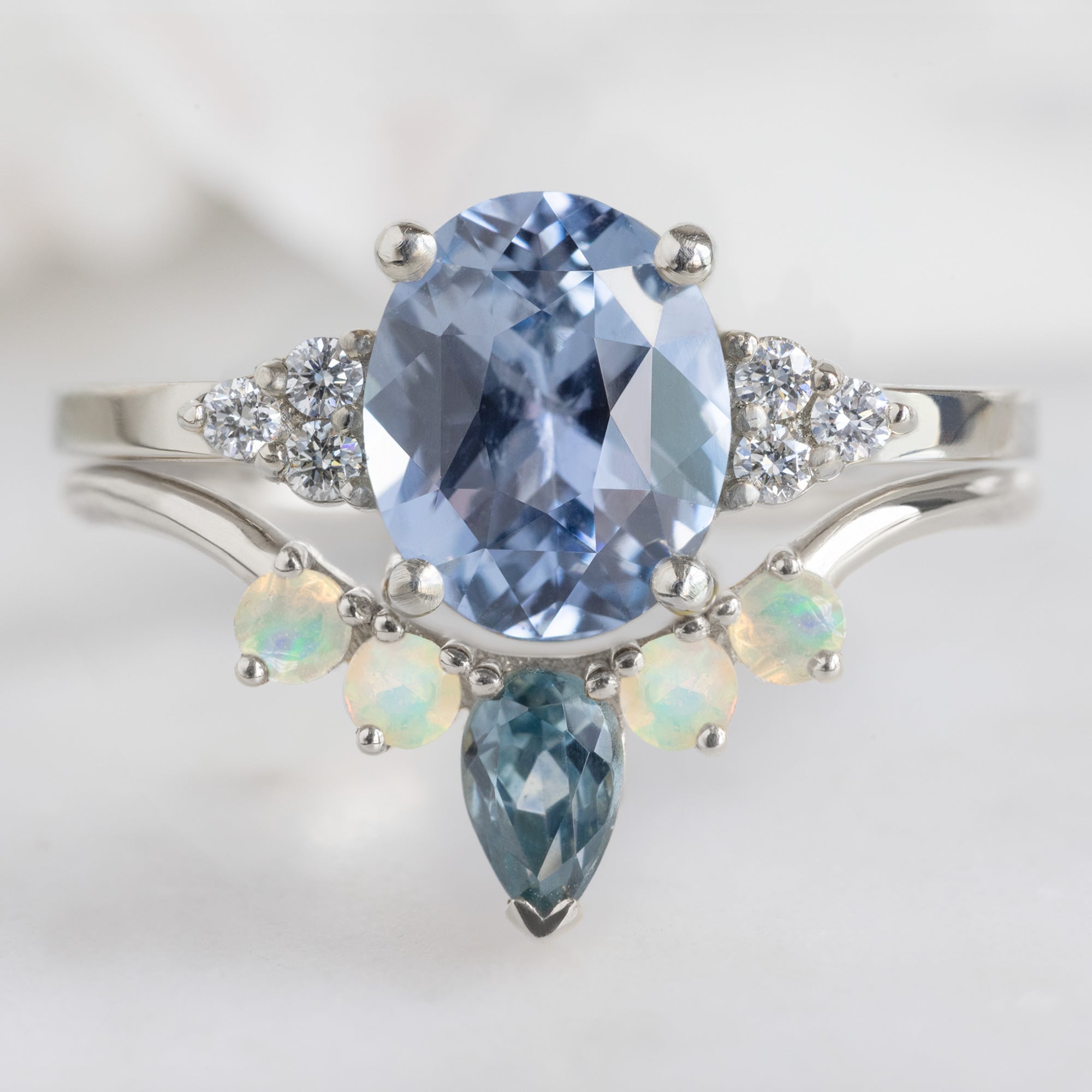 One of a Kind Montana Sapphire + Opal Sunburst Stacking Band in White Gold Stacked with Oval Sapphire Gemstone Engagement Ring