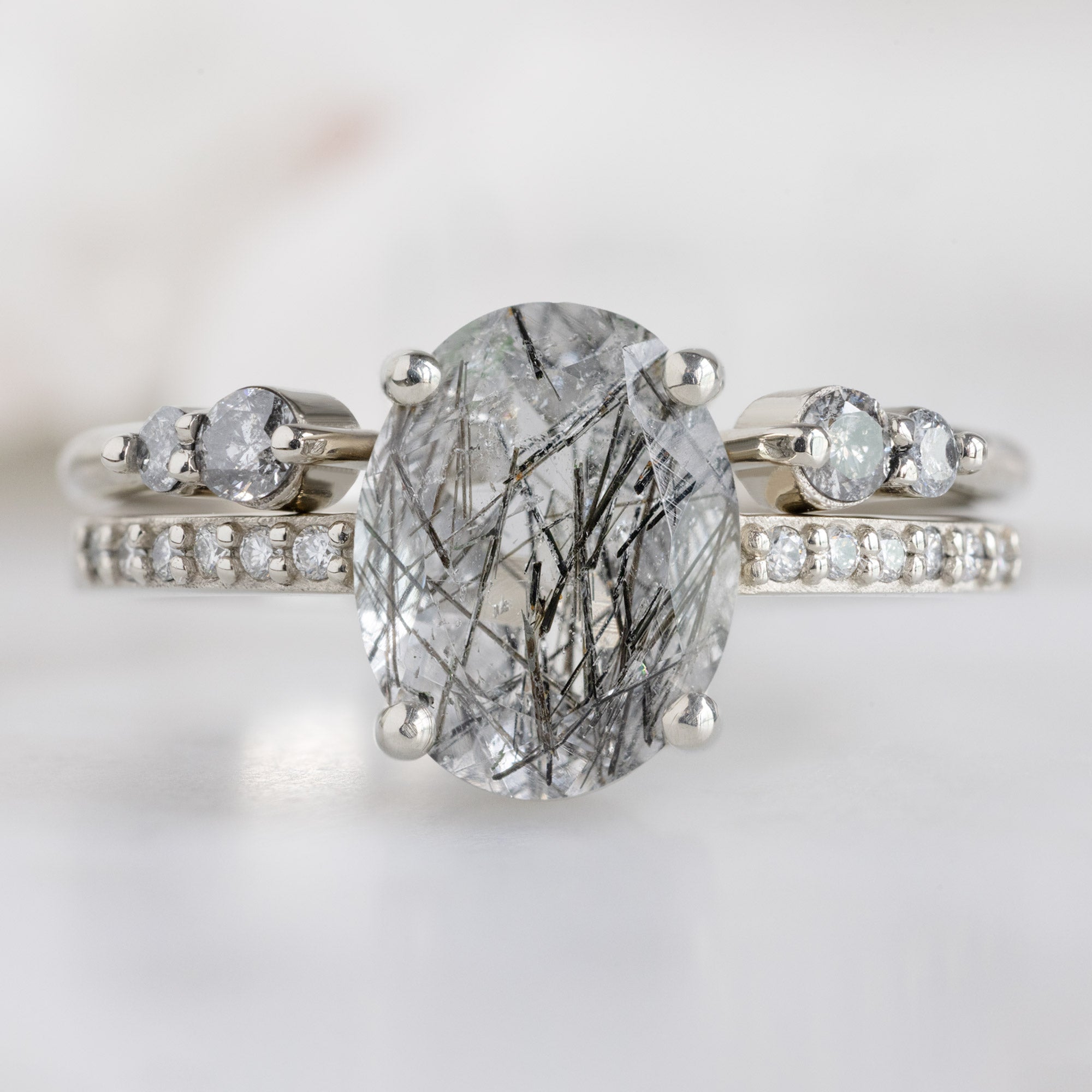 The Luxe Open Cuff Salt and Pepper Round Diamond Stacking Band in 14K Yellow Gold stacked with gemstone engagement ring