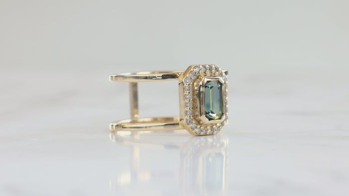 The Poppy Ring with an Emerald-Cut Montana Sapphire