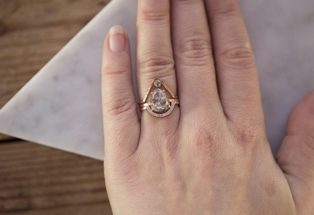 Custom Pavé Diamond Arc Stacking Ring on Model with Diamond Engagement Ring