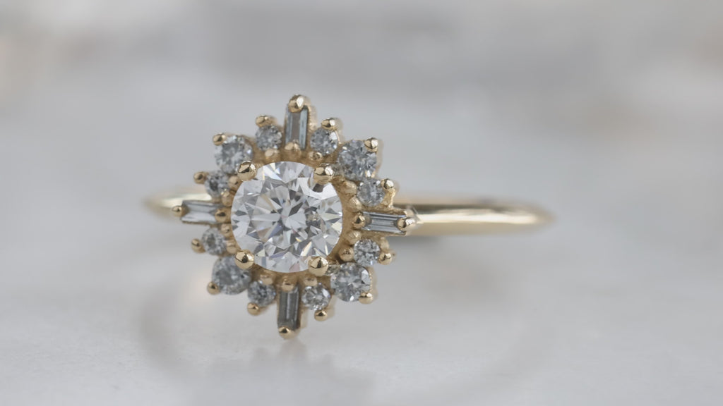 The Compass Ring with a Round-Cut White Diamond