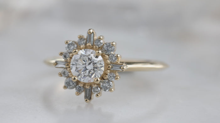 The Compass Ring with a Round-Cut White Diamond