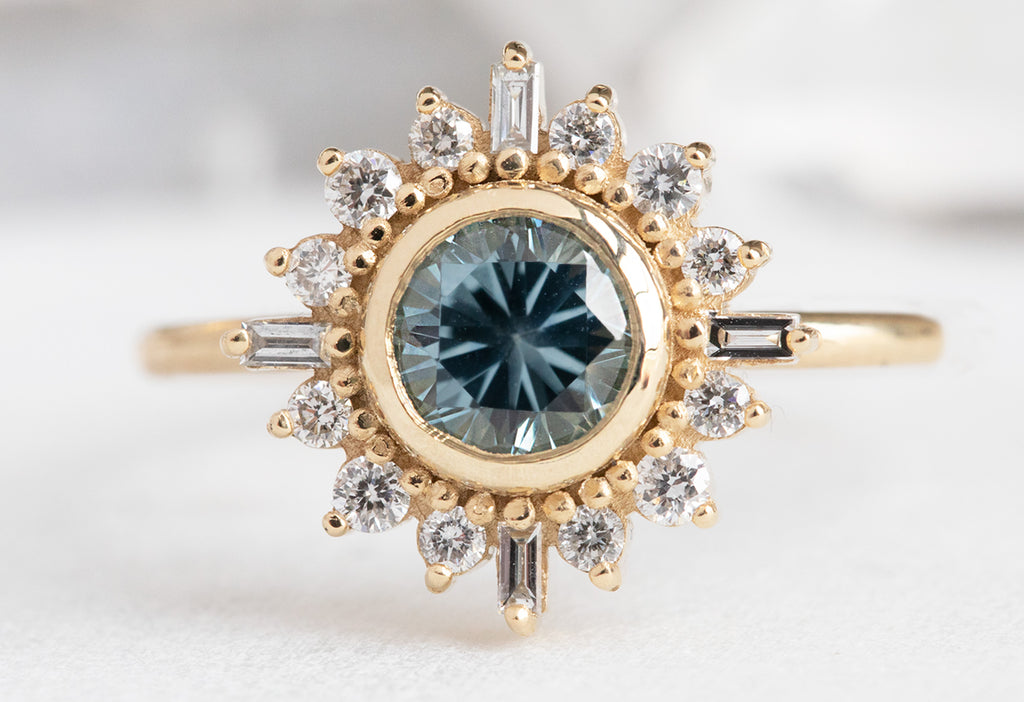 The Compass Ring with a Round-Cut Sapphire