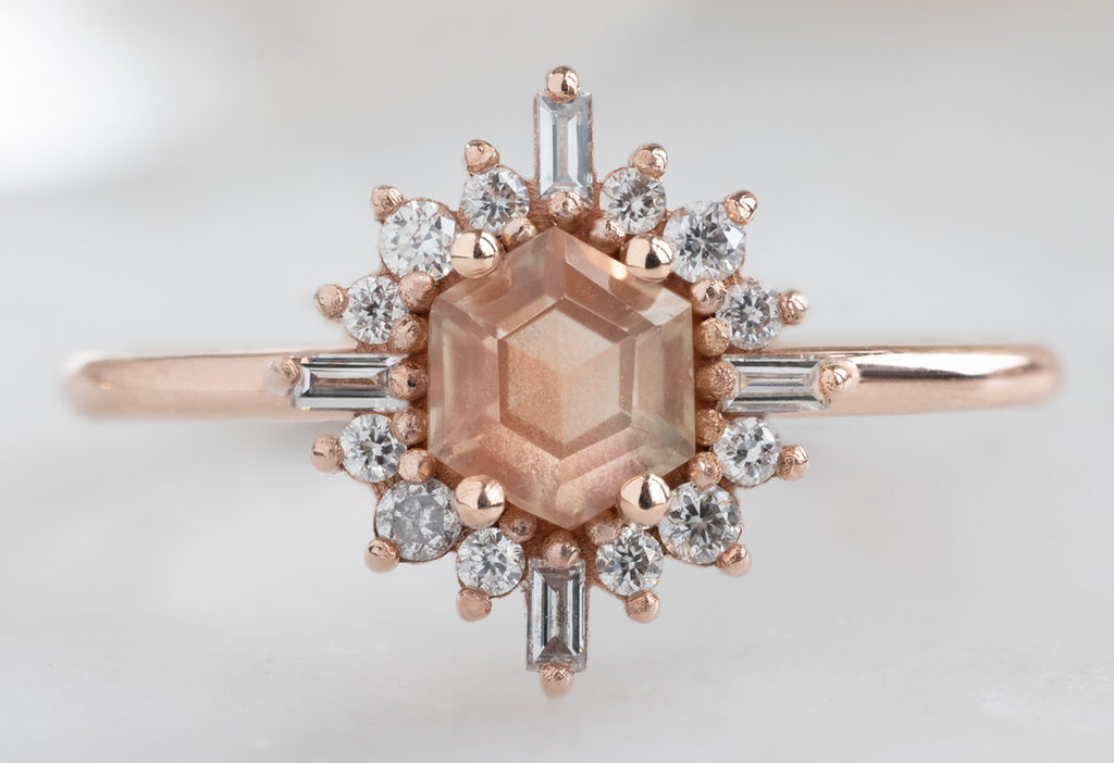 The Compass Ring with a Hexagon-Cut Sunstone