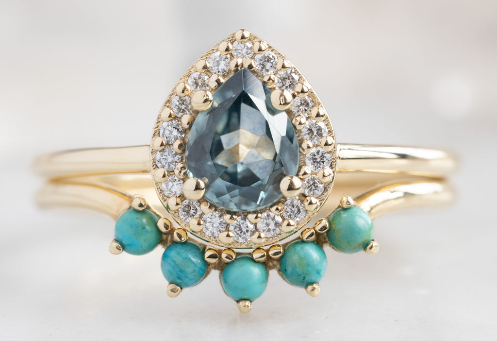 The Dahlia Ring with a Pear-Cut Montana Sapphire