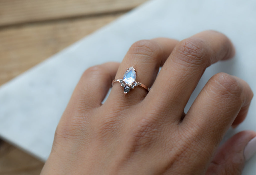 Pear Cut Moonstone Engagement Ring with Black + White Diamond Sunburst