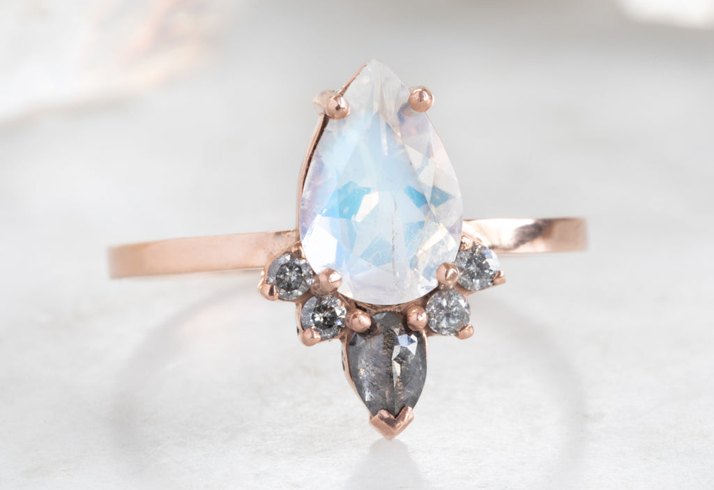 Pear Cut Moonstone Engagement Ring with Black + White Diamond Sunburst
