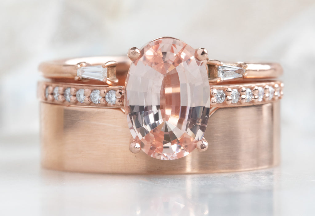 Oval Cut Pink Sapphire Engagement Ring with Pavé Band