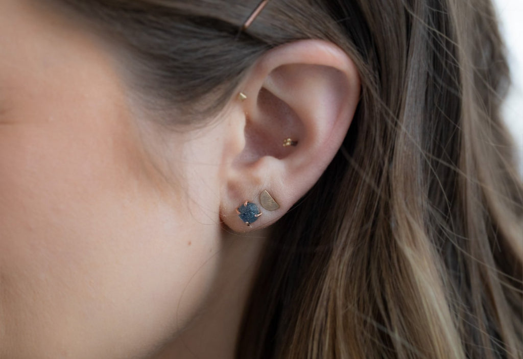 Raw Sapphire Stud Earrings on model