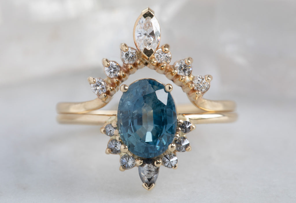 Oval Cut Sapphire Engagement Ring with Attached Diamond Sunburst
