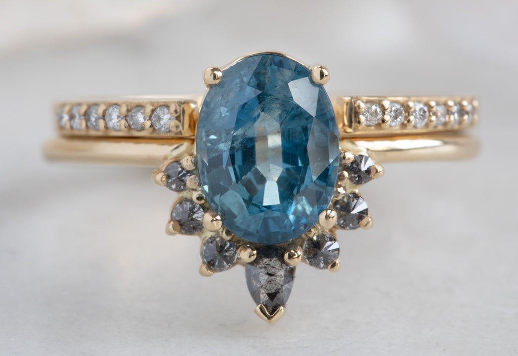 Oval Cut Sapphire Engagement Ring with Attached Diamond Sunburst