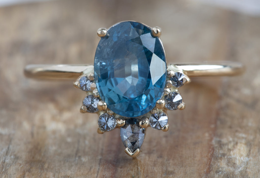 Oval Cut Sapphire Engagement Ring with Attached Diamond Sunburst
