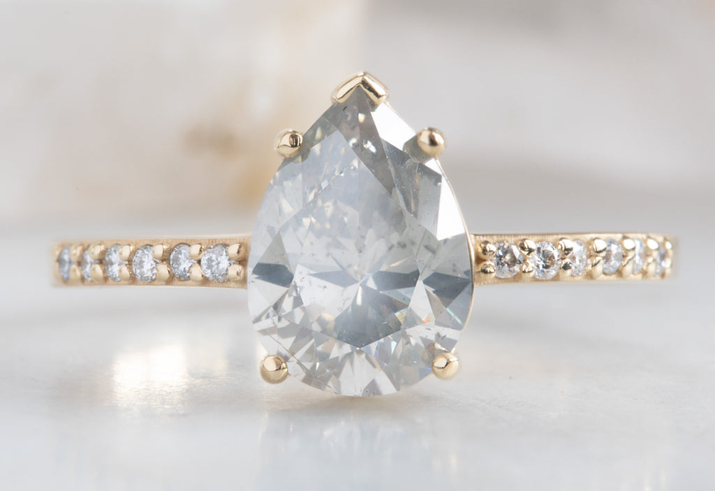 Silver-Grey Pear Cut Diamond Engagement Ring with Pavé Band
