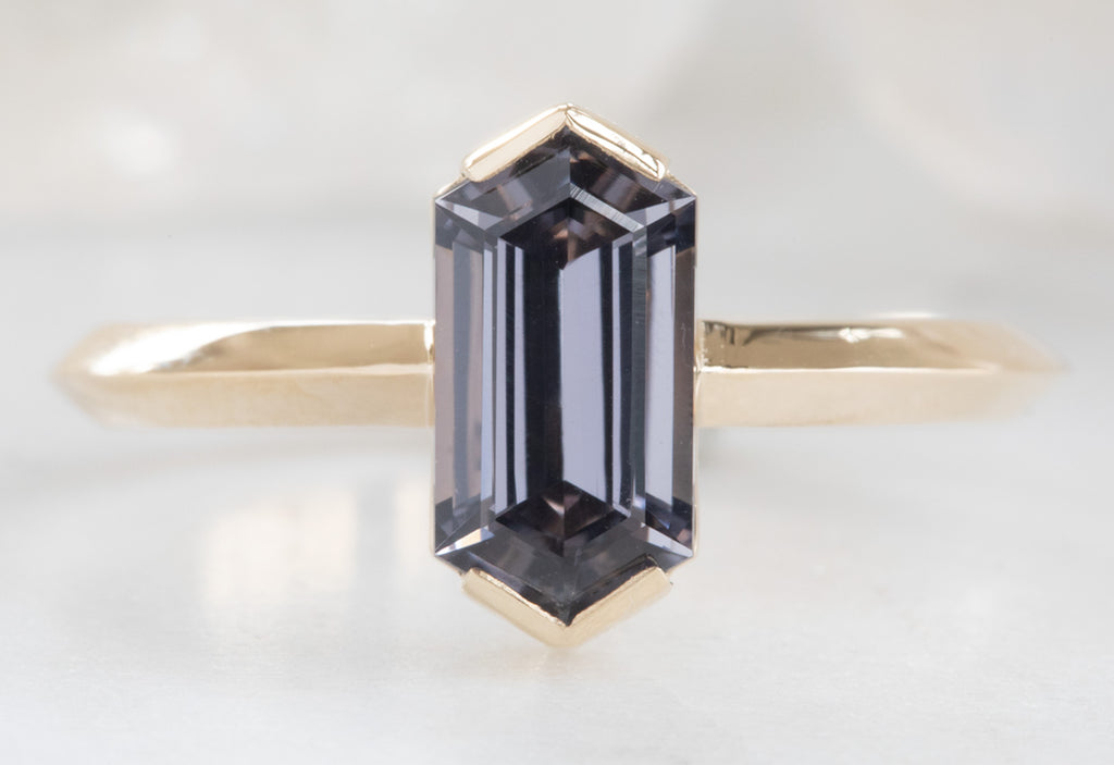 Hexagon Cut Violet Spinel Engagement Ring with Knife Edge Band