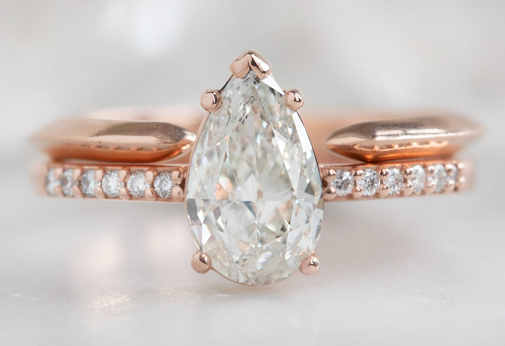 One Of A Kind Pear Cut White Diamond Engagement Ring with Pavé Band