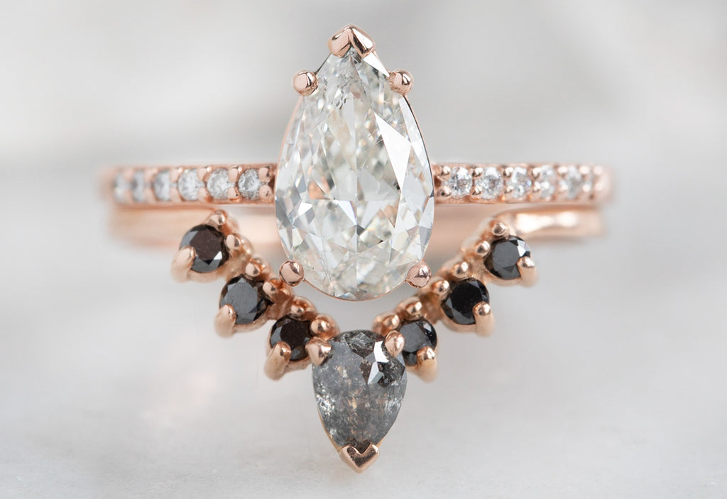 One Of A Kind Pear Cut White Diamond Engagement Ring with Pavé Band