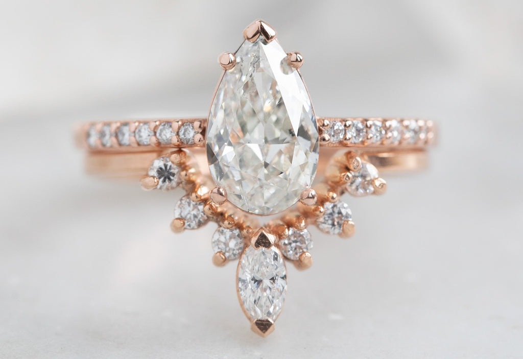 One Of A Kind Pear Cut White Diamond Engagement Ring with Pavé Band