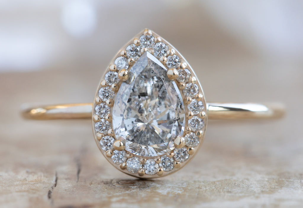 One Of A Kind Pear Cut White Diamond Engagement Ring with Halo