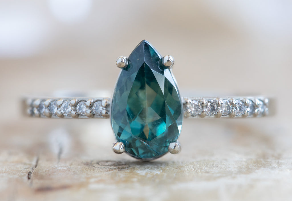 Pear Cut Sapphire Engagement Ring with Pavé Diamond Band