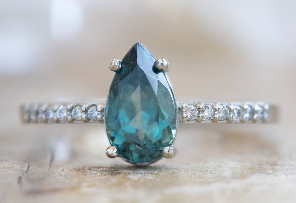 Pear Cut Sapphire Engagement Ring with Pavé Diamond Band