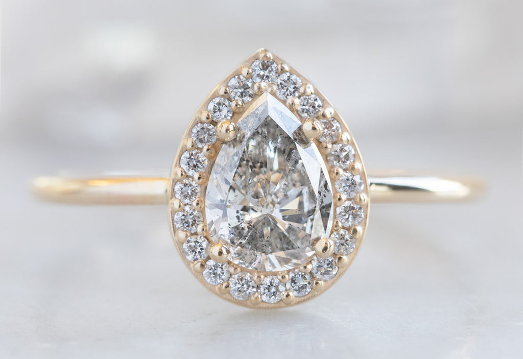One Of A Kind Pear Cut White Diamond Engagement Ring with Halo