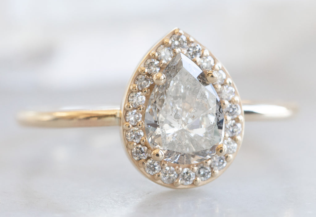 One Of A Kind Pear Cut White Diamond Engagement Ring with Halo