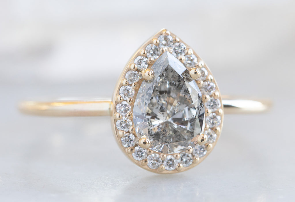 One Of A Kind Pear Cut White Diamond Engagement Ring with Halo