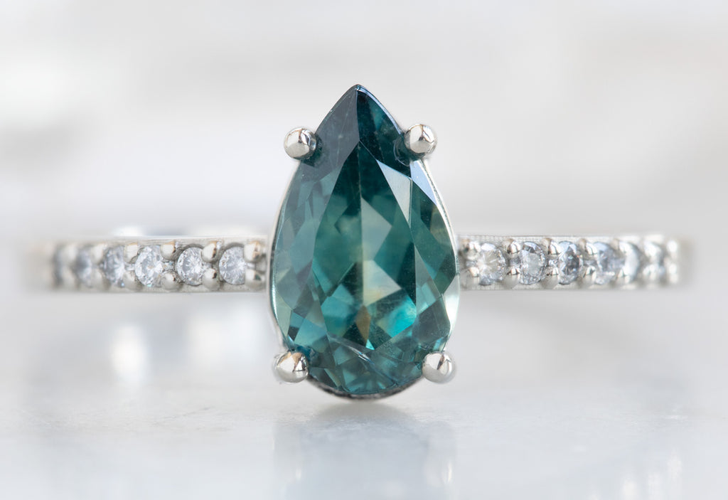 Pear Cut Sapphire Engagement Ring with Pavé Diamond Band