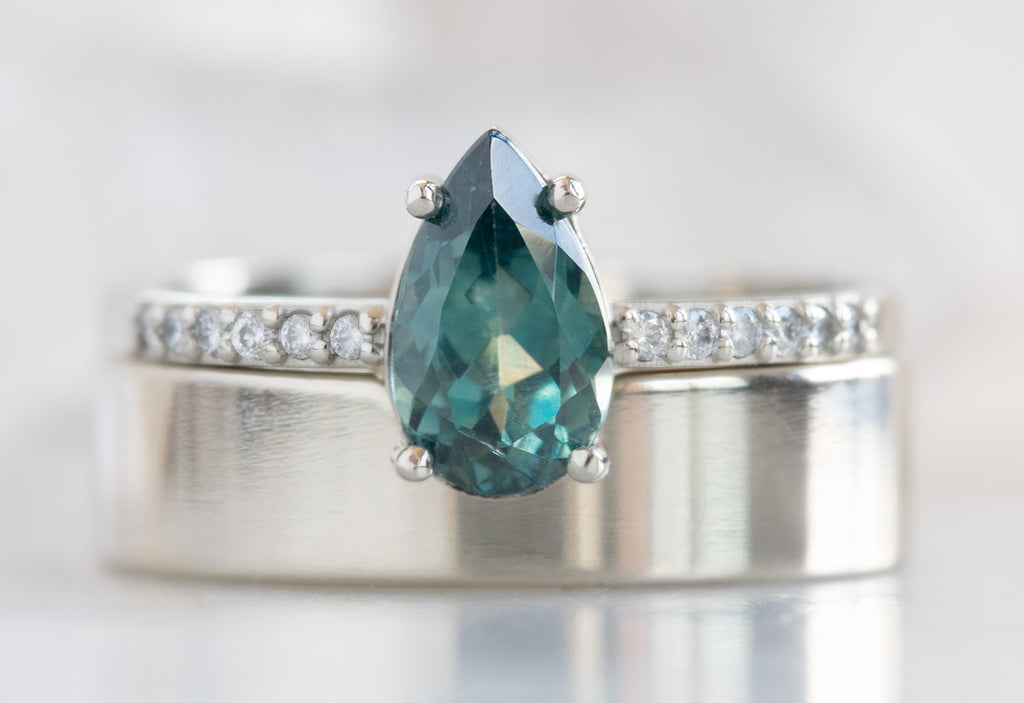 Pear Cut Sapphire Engagement Ring with Pavé Diamond Band
