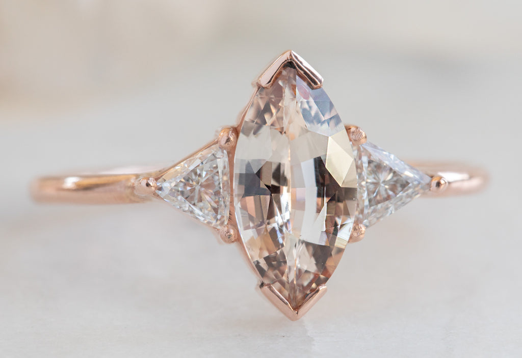 Three Stone Peach Sapphire + Diamond Engagement Ring