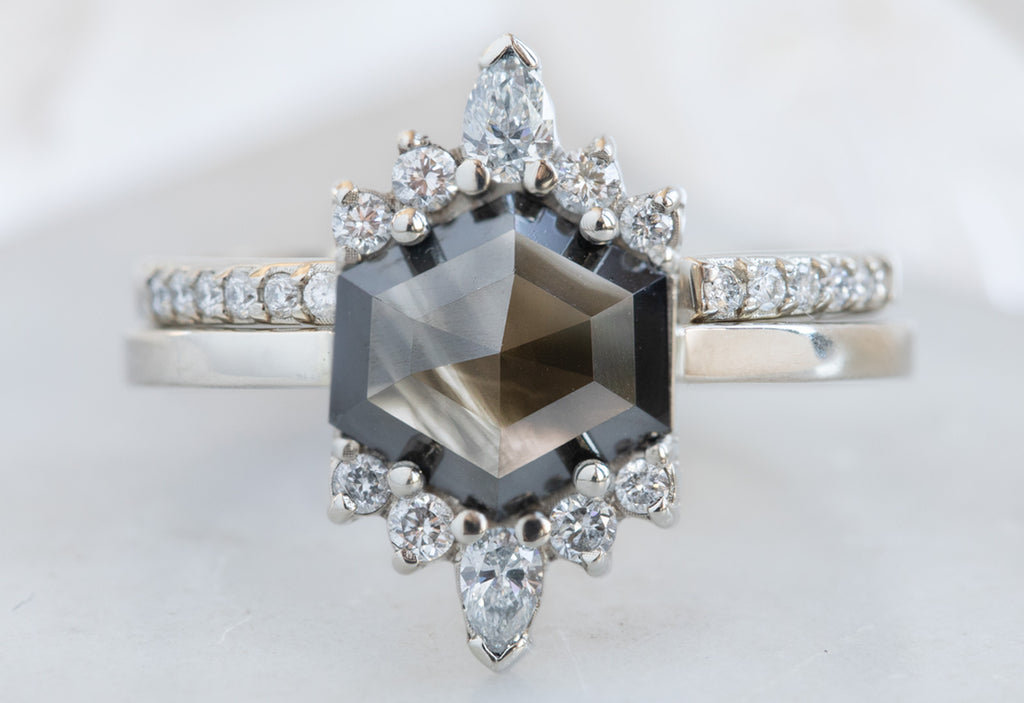 Hexagon-Cut Opalescent Black Diamond Engagement Ring with White Sunbursts