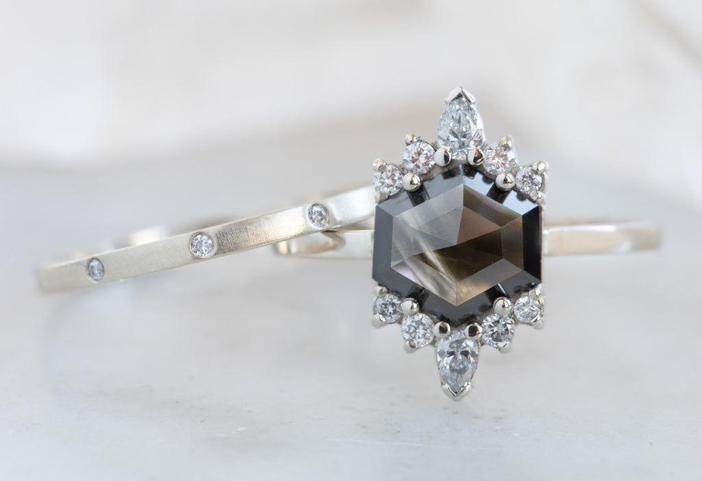 Hexagon-Cut Opalescent Black Diamond Engagement Ring with White Sunbursts