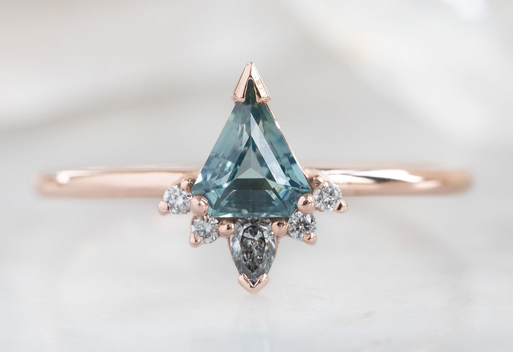 Shield Cut Sapphire Engagement Ring with Attached Diamond Sunburst