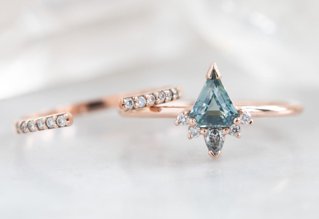 Shield Cut Sapphire Engagement Ring with Attached Diamond Sunburst