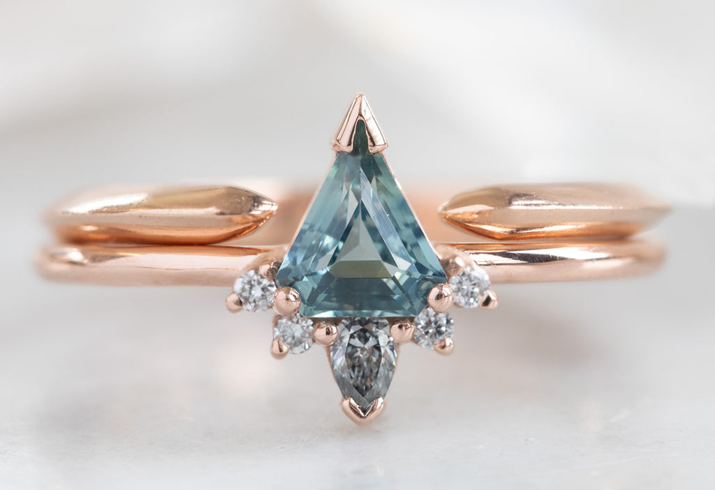 Shield Cut Sapphire Engagement Ring with Attached Diamond Sunburst