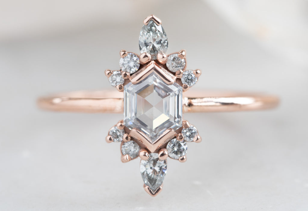 Hexagon Cut White Diamond Engagement Ring with Attached Sunbursts