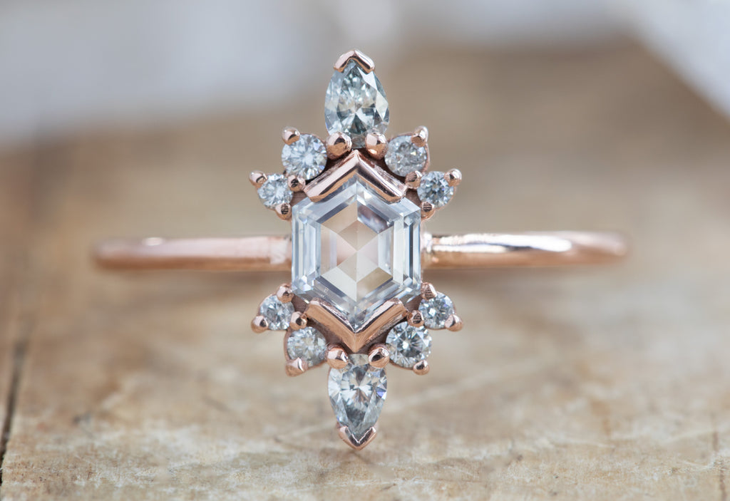 Hexagon Cut White Diamond Engagement Ring with Attached Sunbursts