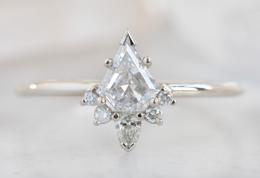 Shield Cut Brilliant White Diamond Engagement Ring with Attached Sunburst
