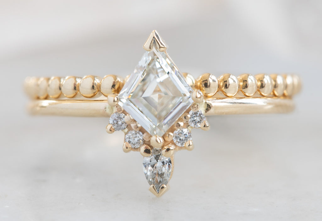Kite-Shaped White Diamond Engagement Ring with Attached Sunburst