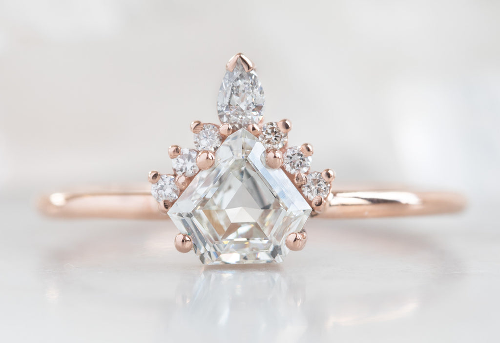 Shield Cut White Diamond Engagement Ring with Attached Sunburst
