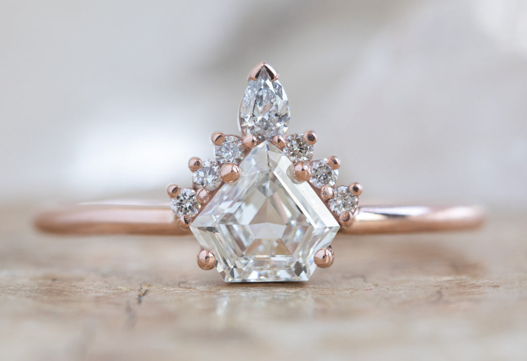 Shield Cut White Diamond Engagement Ring with Attached Sunburst