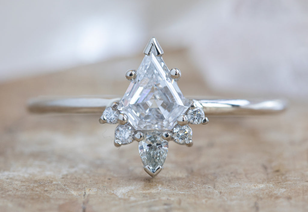 Shield Cut Brilliant White Diamond Engagement Ring with Attached Sunburst