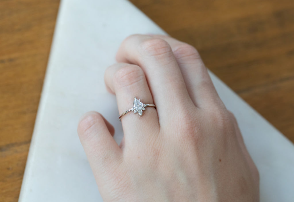 Shield Cut Brilliant White Diamond Engagement Ring with Attached Sunburst
