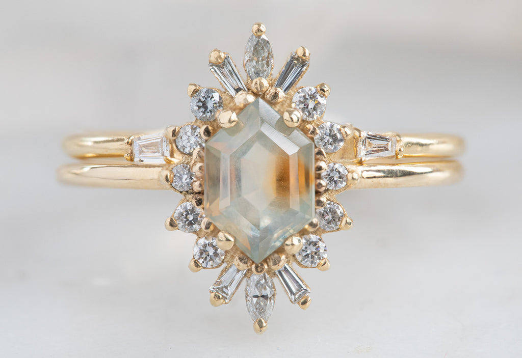 The Camellia Ring with a Hexagon-Cut Sapphire