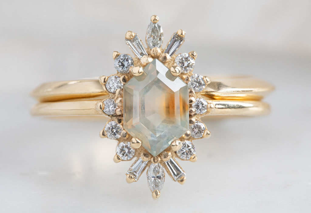The Camellia Ring with a Hexagon-Cut Sapphire