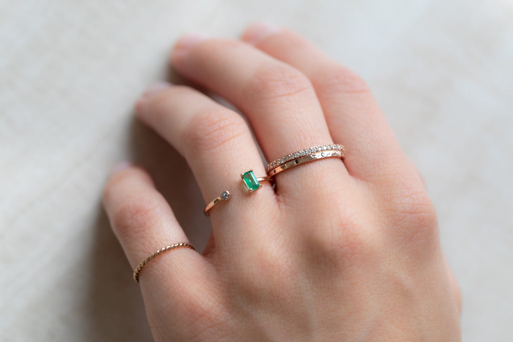 Open Cuff Emerald and Diamond Ring stacked on model