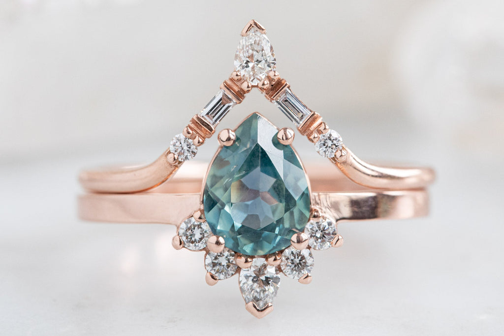 The Aster Ring with a Pear Cut Sapphire With Stacking Band