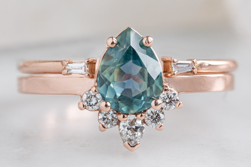 The Aster Ring with a Pear Cut Sapphire With Stacking Band