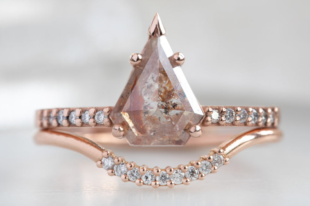 The Willow Ring with a Shield Cut Red Diamond with stacking band