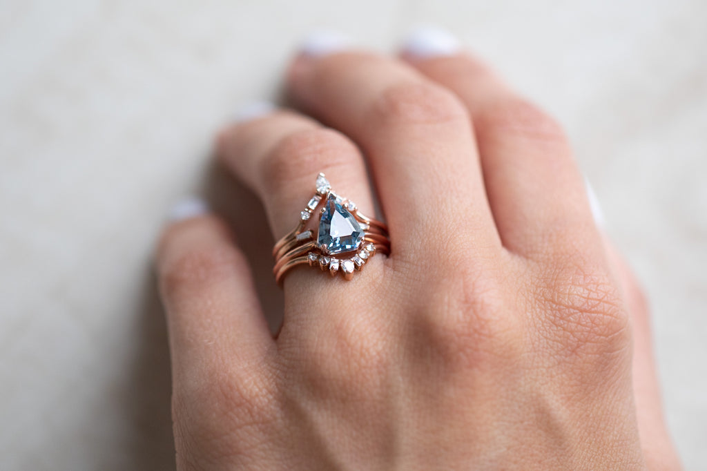 The Sage Ring With a Shield Cut Sapphire With Stacking Band